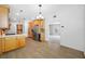 A spacious kitchen area with wood cabinets, quartz countertops, stainless appliances, and room for entertaining at 401 Whitcomb Blvd, Tarpon Springs, FL 34689