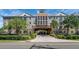 Stunning exterior view of an upscale condominium complex with manicured landscaping and attractive architecture at 4221 W Spruce St # 1303, Tampa, FL 33607