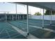 Outdoor shuffleboard courts with covered seating area for residents' enjoyment and recreation at 4345 Tahitian Gardens Cir # C, Holiday, FL 34691
