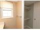 Bathroom features a built-in storage shelves at 4513 S Oak Dr # Q31B, Tampa, FL 33611