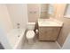 Stylish bathroom with modern vanity, tub, and fixtures at 4513 S Oak Dr # Q31B, Tampa, FL 33611