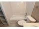 Cozy bathroom featuring a shower-tub combo at 4513 S Oak Dr # Q31B, Tampa, FL 33611
