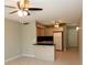 Kitchen and dining space with a breakfast bar and ceiling fans for added comfort at 4513 S Oak Dr # Q31B, Tampa, FL 33611