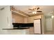 Kitchen with easy access to the dining area and features modern appliances and cabinetry at 4513 S Oak Dr # Q31B, Tampa, FL 33611