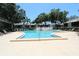 Enjoy the community pool with lounge chairs at 4513 S Oak Dr # Q31B, Tampa, FL 33611