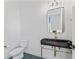 Stylish powder room featuring a modern black sink and vanity at 4911 N Nebraska Ave, Tampa, FL 33603
