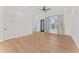 Bright bedroom with a ceiling fan, balcony, and a minimalist, modern design at 4911 N Nebraska Ave, Tampa, FL 33603