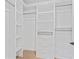 Walk-in closet with custom shelving and storage solutions at 4911 N Nebraska Ave, Tampa, FL 33603