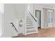 Bright staircase with natural light filtering through the windows at 4911 N Nebraska Ave, Tampa, FL 33603