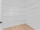 Spacious walk-in closet with custom wire shelving providing ample storage space at 4911 N Nebraska Ave, Tampa, FL 33603