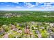 Aerial view highlighting the location of the single Gathering home and surrounding neighborhood near the lake at 5112 Lanai Way, Tampa, FL 33624