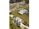 Overhead perspective shows a public skate park, an event gathering spot with palm trees, and ample parking nearby at 5112 Lanai Way, Tampa, FL 33624