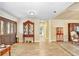 Elegant foyer with hardwood floors and traditional furnishings creates a grand entrance at 5112 Lanai Way, Tampa, FL 33624