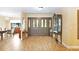 Welcoming foyer with wood flooring and stylish furniture offers a warm entrance at 5112 Lanai Way, Tampa, FL 33624