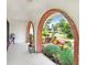 Covered front porch with brick arches offers a serene outdoor space at 5112 Lanai Way, Tampa, FL 33624