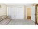 Inviting living room with neutral tones, large closets and an open doorway at 5112 Lanai Way, Tampa, FL 33624