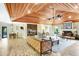 Cozy living room with beautiful wood ceilings and plenty of natural light at 5112 Lanai Way, Tampa, FL 33624