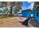 Spacious backyard featuring a gazebo, landscaping, a large tree, and a shed at 520 4Th Nw St, Largo, FL 33770