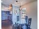 Cozy dining area with a glass table, modern chairs, and ample natural light at 520 4Th Nw St, Largo, FL 33770