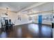 Open-concept dining area with modern lighting and seating for four at 520 4Th Nw St, Largo, FL 33770
