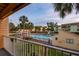Enjoy the community pool view from this charming balcony, complete with a decorative railing at 531 Sandy Hook Rd, Treasure Island, FL 33706