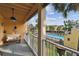 Charming balcony overlooking the community pool, perfect for relaxation and outdoor enjoyment at 531 Sandy Hook Rd, Treasure Island, FL 33706