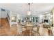 Cozy dining area is conveniently located off the living room with easy access to a fireplace at 531 Sandy Hook Rd, Treasure Island, FL 33706