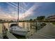 A sailboat is tied up at a private marina with beautiful sunset views at 531 Sandy Hook Rd, Treasure Island, FL 33706