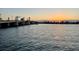 Scenic view of the bridge and sunset over the water, highlighting the peaceful waterfront at 531 Sandy Hook Rd, Treasure Island, FL 33706