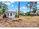 Spacious backyard featuring lush greenery and a well-maintained lawn at 6120 5Th N Ave, St Petersburg, FL 33710