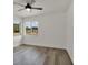 Bright bedroom with hardwood flooring and large windows allowing lots of natural light at 6120 5Th N Ave, St Petersburg, FL 33710