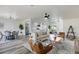 Open living room with a view to dining and kitchen areas, features hardwood floors at 6120 5Th N Ave, St Petersburg, FL 33710