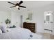 Spacious main bedroom showcasing a stylish bedroom setup with an ensuite bathroom at 6120 5Th N Ave, St Petersburg, FL 33710