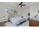 Bright main bedroom featuring ample natural light and comfortable furnishings at 6120 5Th N Ave, St Petersburg, FL 33710