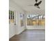 Sun room with door to the backyard and large picture windows at 6120 5Th N Ave, St Petersburg, FL 33710