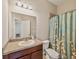 Bathroom features a single sink and tiled shower at 6912 40Th N Ln, Pinellas Park, FL 33781