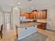 Spacious kitchen featuring a large island with granite countertops and stainless-steel appliances at 6912 40Th N Ln, Pinellas Park, FL 33781