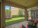 Covered screened-in lanai with view of backyard at 6912 40Th N Ln, Pinellas Park, FL 33781