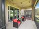 Covered screened-in lanai with comfortable seating at 6912 40Th N Ln, Pinellas Park, FL 33781