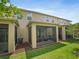 Inviting screened-in porch with comfortable seating, perfect for outdoor relaxation and enjoying the backyard view at 6912 40Th N Ln, Pinellas Park, FL 33781