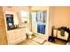 Bathroom featuring a vanity, toilet, and walk-in shower at 7012 Pin Cherry Ln, Port Richey, FL 34668