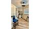 Cozy coffee station with white cabinets, beverage cooler and complementary decor at 7012 Pin Cherry Ln, Port Richey, FL 34668