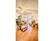 Spacious room with wood floors at 7012 Pin Cherry Ln, Port Richey, FL 34668