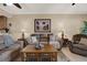 Inviting living room featuring comfortable seating, stylish decor, and ample natural light at 7069 Key Haven Rd # 602, Seminole, FL 33777