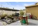 Enclosed backyard featuring a grill, patio, and outdoor plants at 7606 Woodbridge Blvd, Tampa, FL 33615