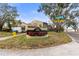 Welcome to Marganwoods District: a vibrant community with lush landscaping and convenient street access at 7606 Woodbridge Blvd, Tampa, FL 33615