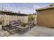 Back patio featuring comfortable furniture, plants and a privacy fence at 7606 Woodbridge Blvd, Tampa, FL 33615