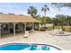 The pool area features a covered patio, plenty of seating, and easy access for residents of the complex at 7606 Woodbridge Blvd, Tampa, FL 33615
