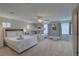 Spacious bedroom with a ceiling fan, a cozy bed, a bunk bed and plenty of natural light at 8117 Bay Dr, Tampa, FL 33635