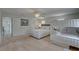 Large bedroom features two beds, bunk beds, and stylish decor, creating a comfortable and inviting space at 8117 Bay Dr, Tampa, FL 33635